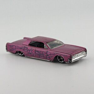 HotWheels 1964 Continental Purple W/Purple Flames collectible diecast car